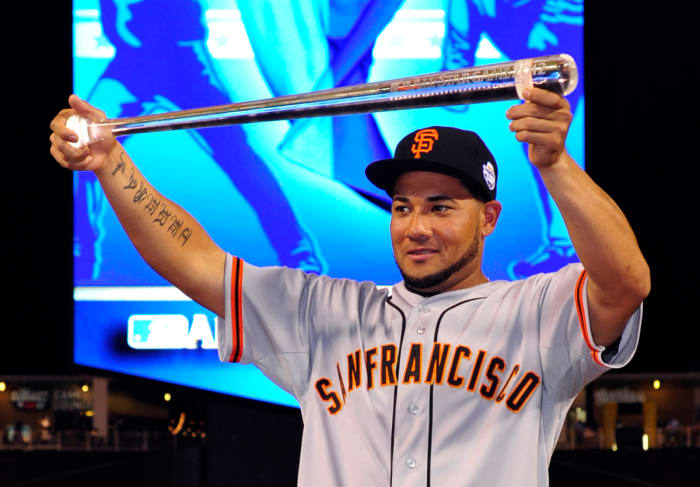 National League outfielder Melky Cabrera of the SF Giants is awarded the MVP award for the 2012 All-Star Game at Kauffman Stadium. (2012)